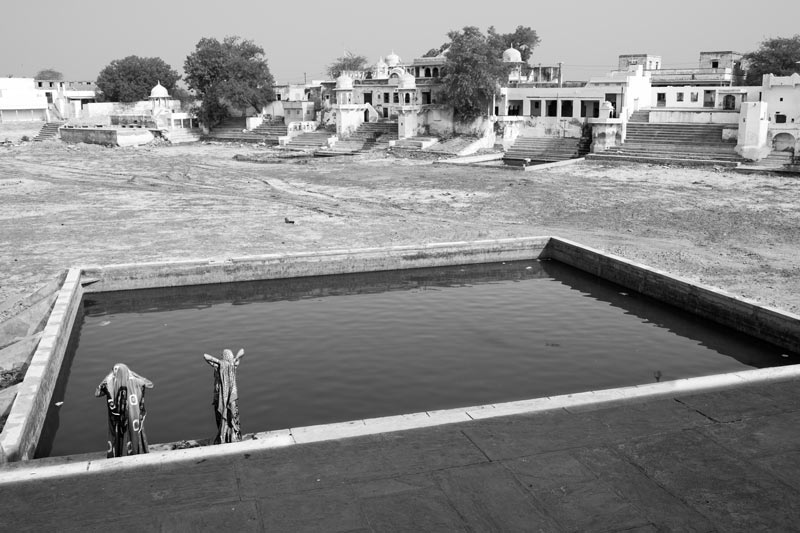 Challenges Impacting the Connection between Water and Religion - Holy bath at a constructed tank inside the sacred Devayani Kund in Sambhar Lake town, district Jaipur, Rajasthan
